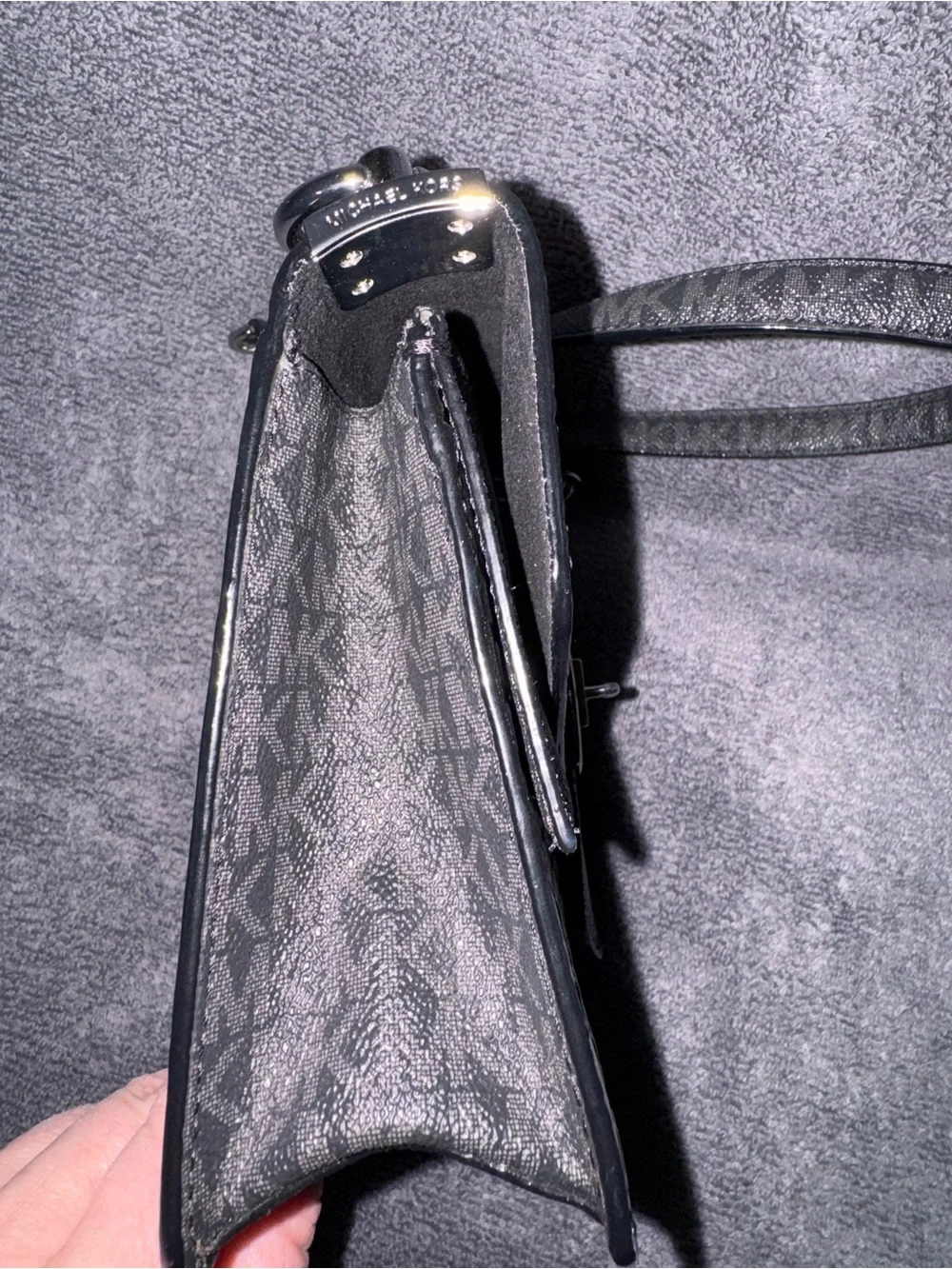 Michael Kors clasp featuring crossbody